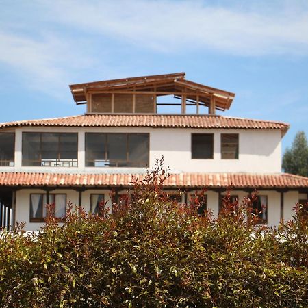 Hotel Tota Eliseo Playa Blanca Lago De توتا المظهر الخارجي الصورة