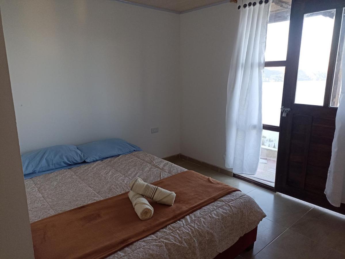 Hotel Tota Eliseo Playa Blanca Lago De توتا المظهر الخارجي الصورة
