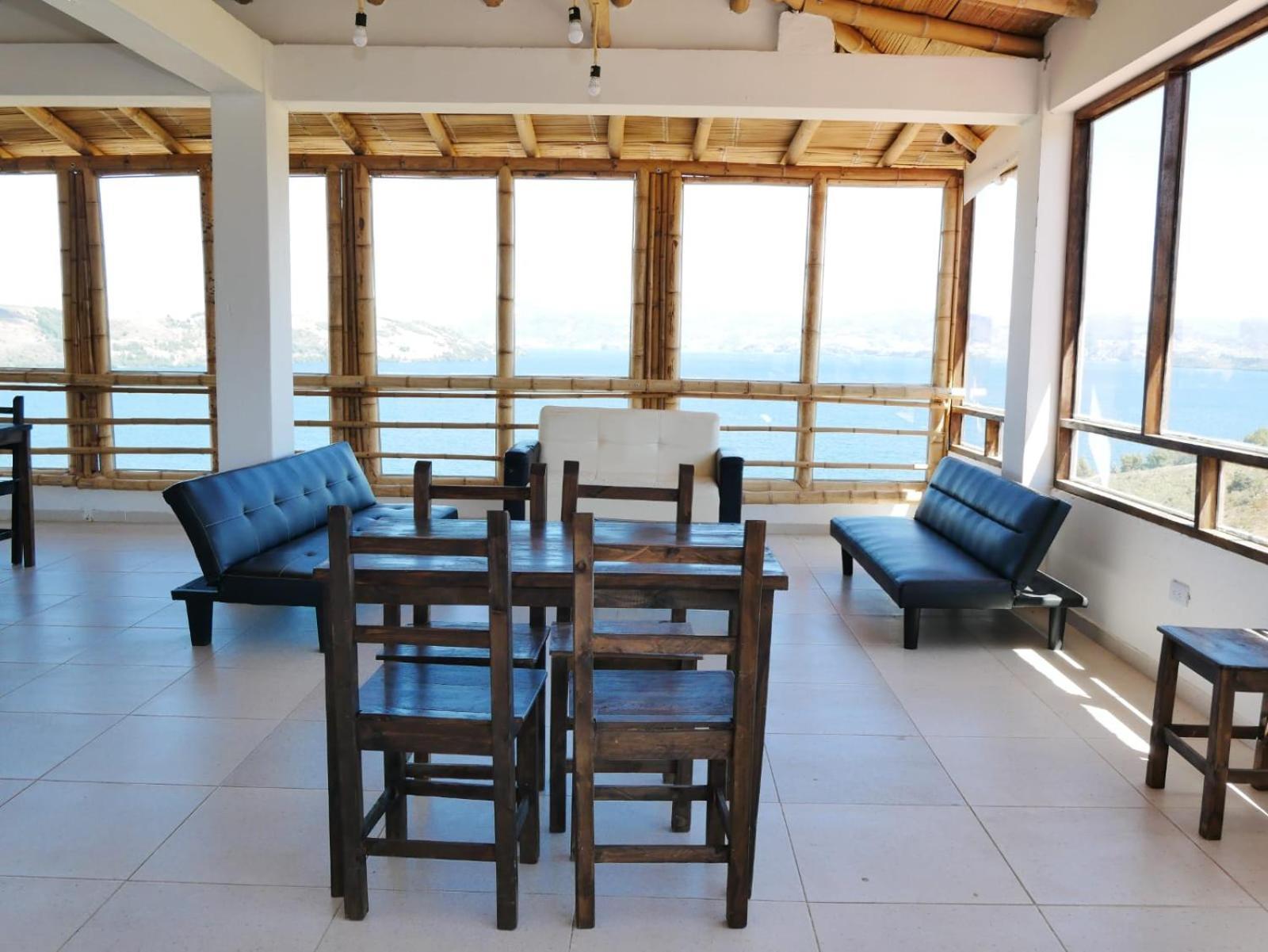 Hotel Tota Eliseo Playa Blanca Lago De توتا المظهر الخارجي الصورة