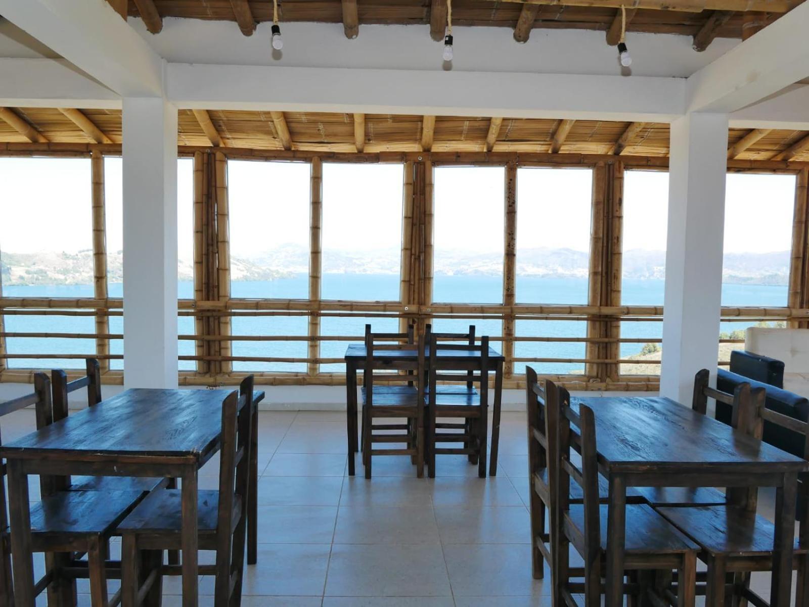 Hotel Tota Eliseo Playa Blanca Lago De توتا المظهر الخارجي الصورة