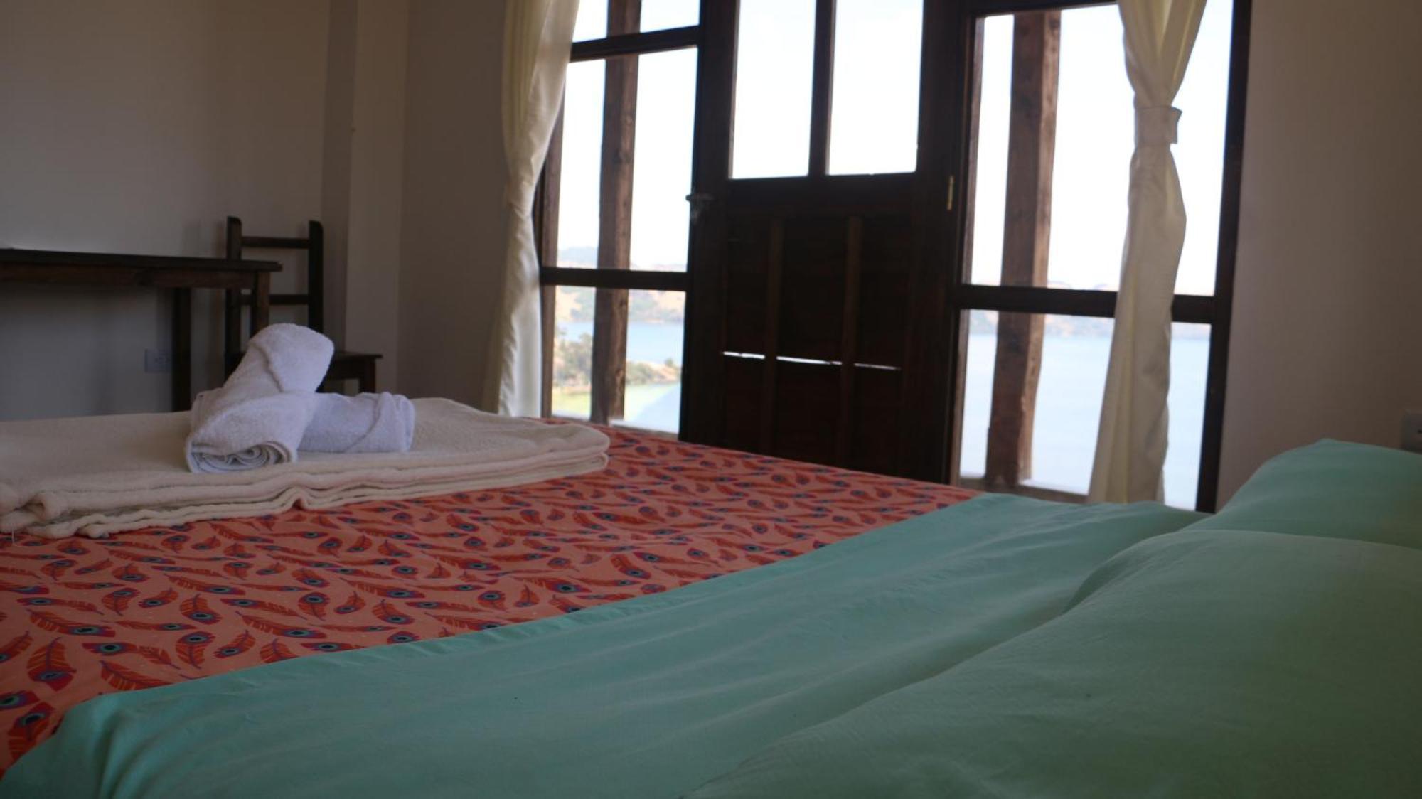 Hotel Tota Eliseo Playa Blanca Lago De توتا المظهر الخارجي الصورة