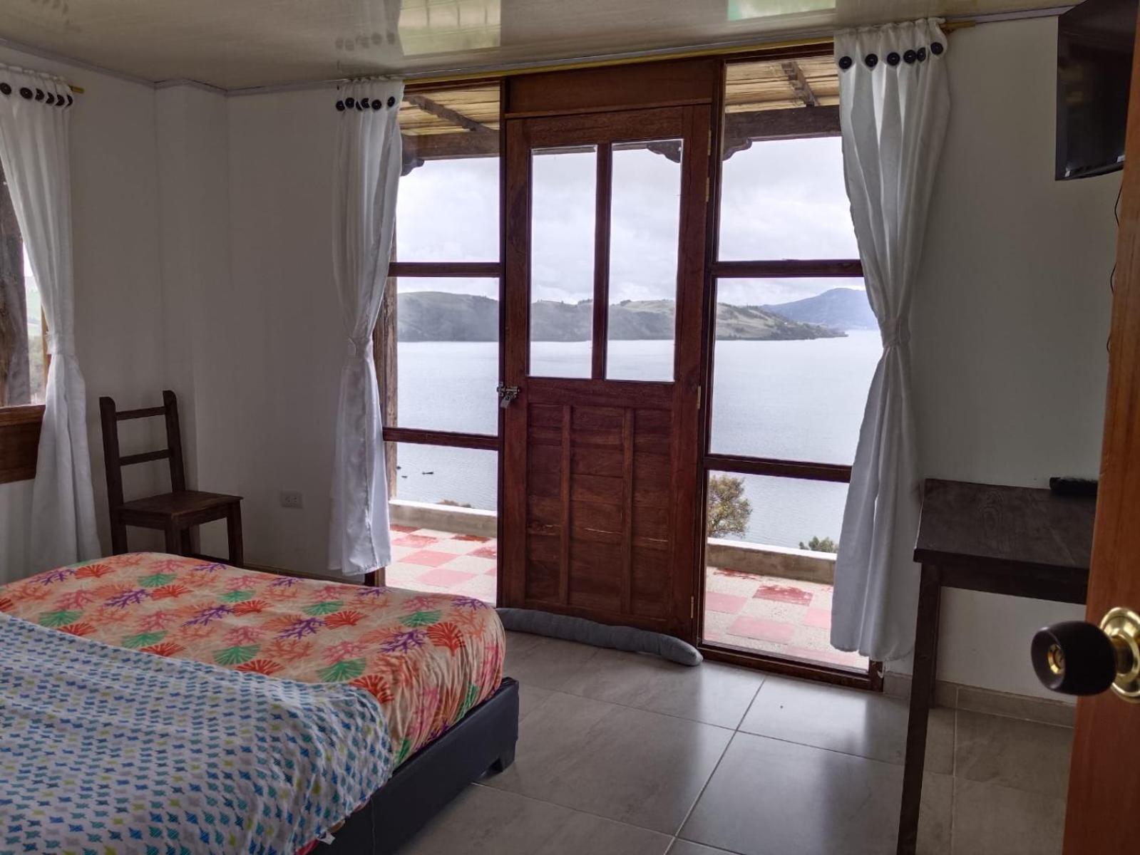 Hotel Tota Eliseo Playa Blanca Lago De توتا المظهر الخارجي الصورة