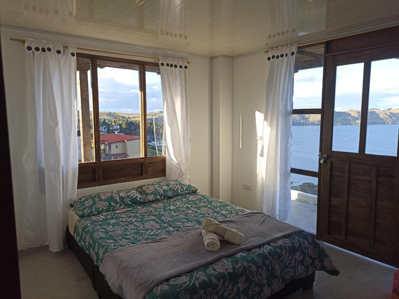 Hotel Tota Eliseo Playa Blanca Lago De توتا المظهر الخارجي الصورة