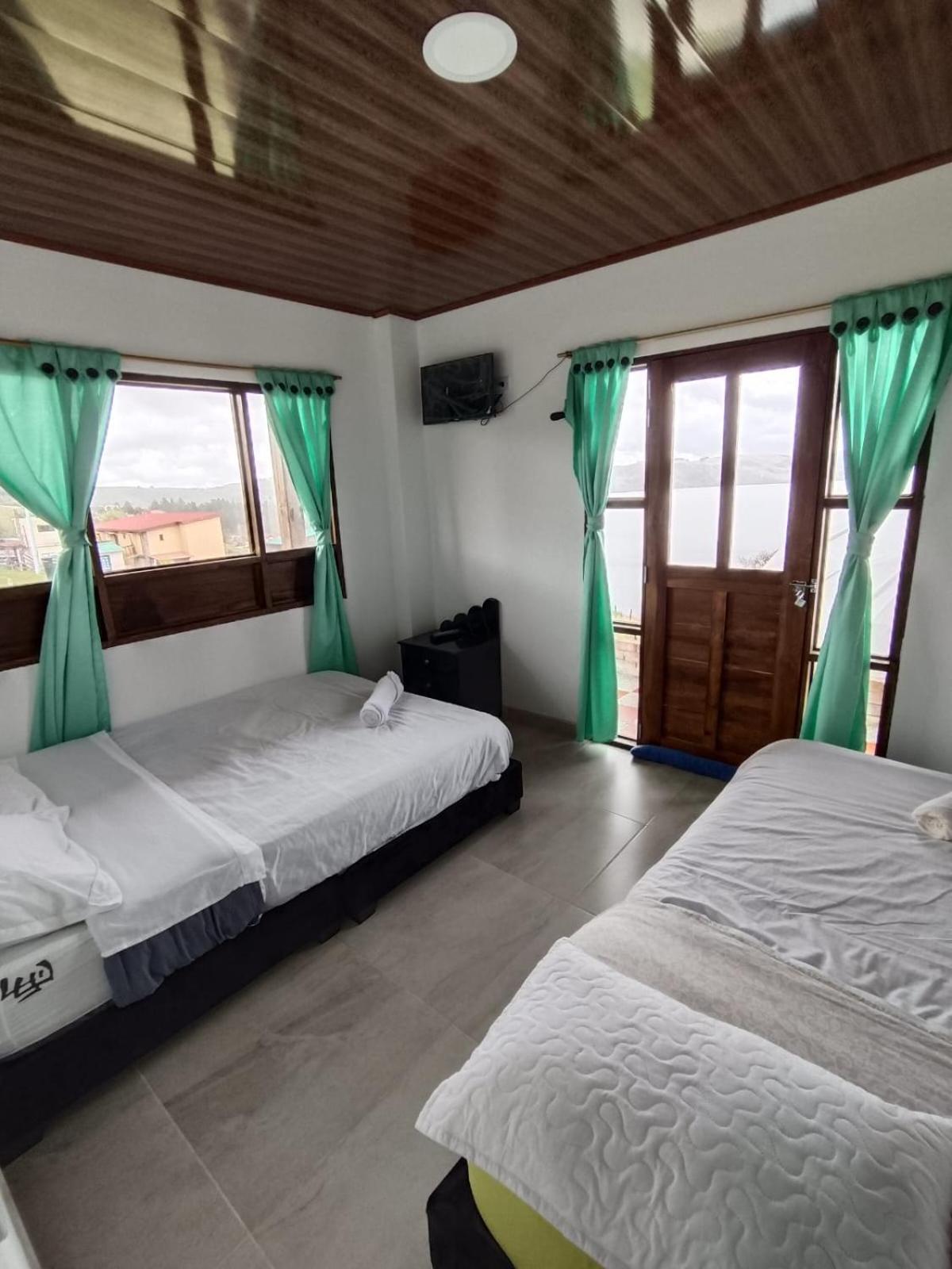 Hotel Tota Eliseo Playa Blanca Lago De توتا المظهر الخارجي الصورة